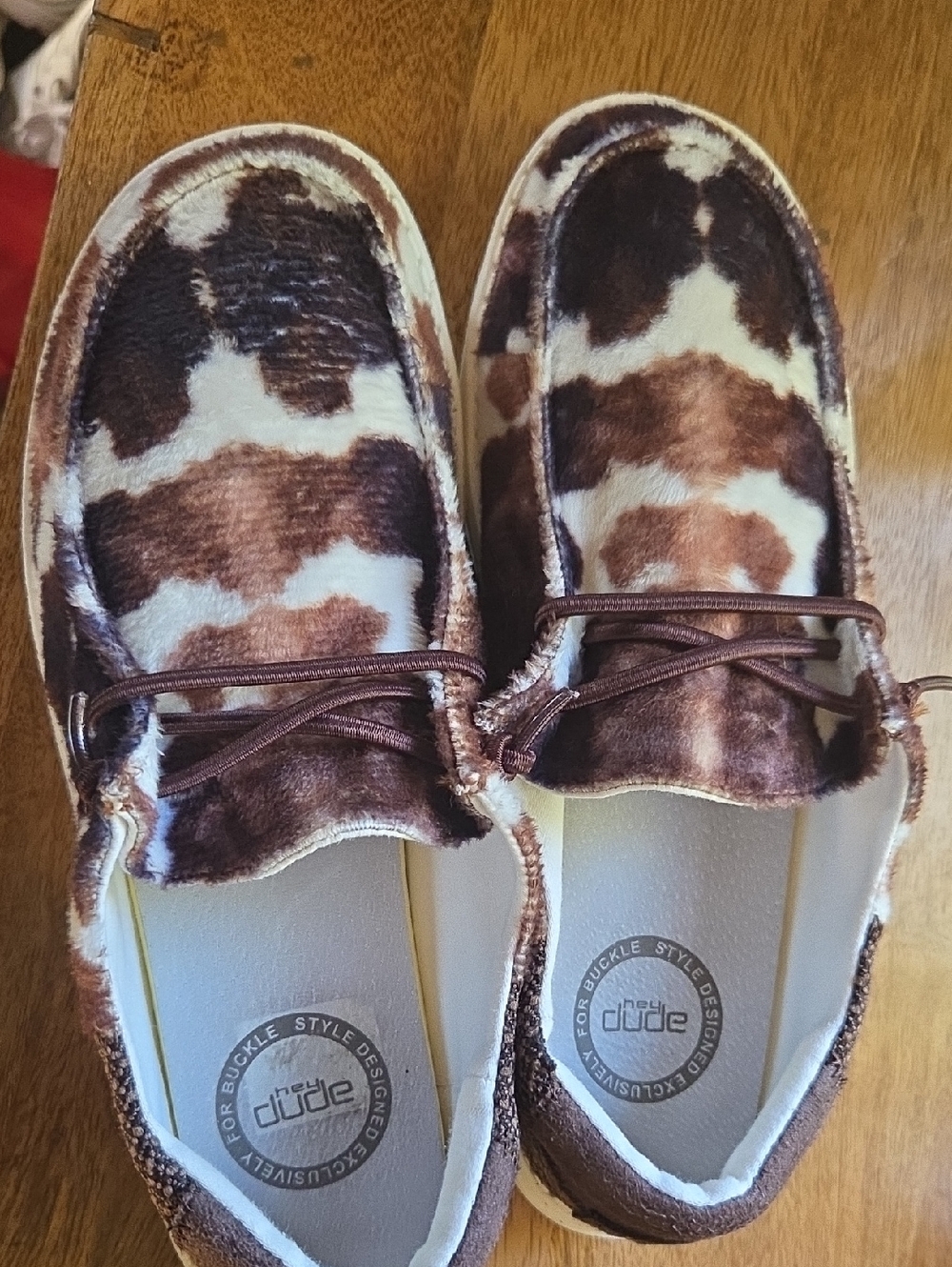 Hey Dude Cowhide-Pattern Slip-Ons in Brown & White